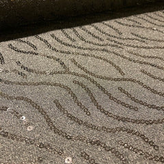 breisel- zwart met pailletten-  € 35/m