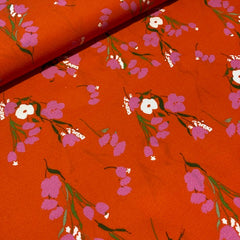 Crepe-  bundel bloemen op rood -  €27/m