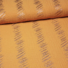 Double Gauze - Oker met hotfoil print  € 19/m